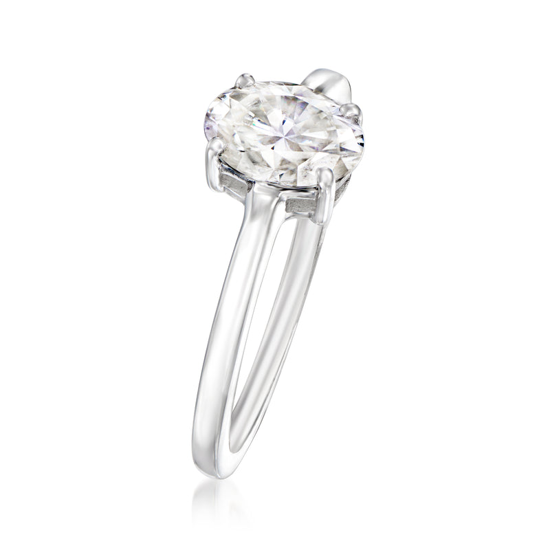 Sterling silver moissanite solitaire ring with round center stone in four prongs