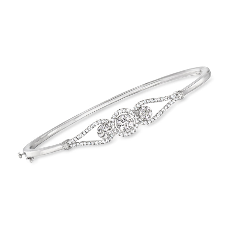14kt white gold diamond cluster bangle with circular stone links, hinged clasp