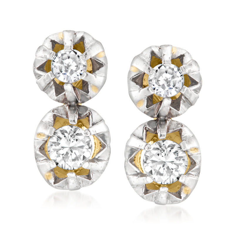 Vintage diamond drop earrings in palladium with 18kt yellow gold accents, round stones.