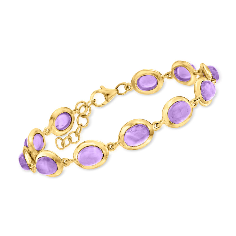 Gold-tone amethyst bracelet with oval purple gemstones and linked chain