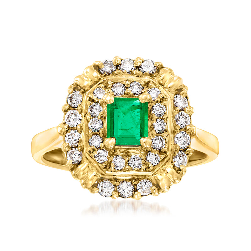 Vintage emerald-cut emerald gemstone with diamond halo cocktail ring in 18kt yellow gold