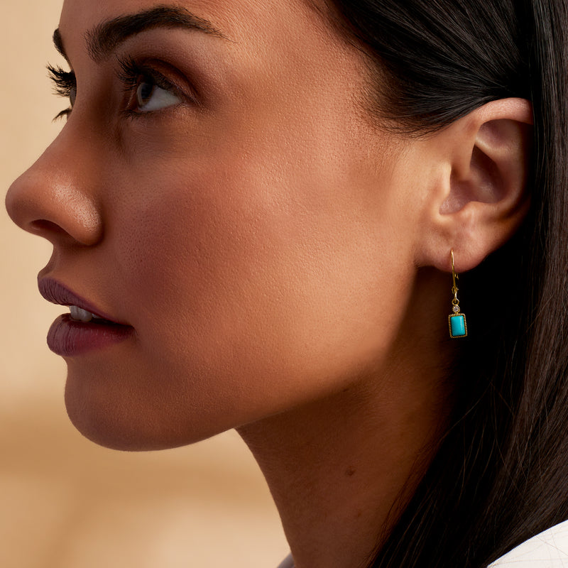 Turquoise square leverback drop earrings in 14kt yellow gold on model, small diamond detail