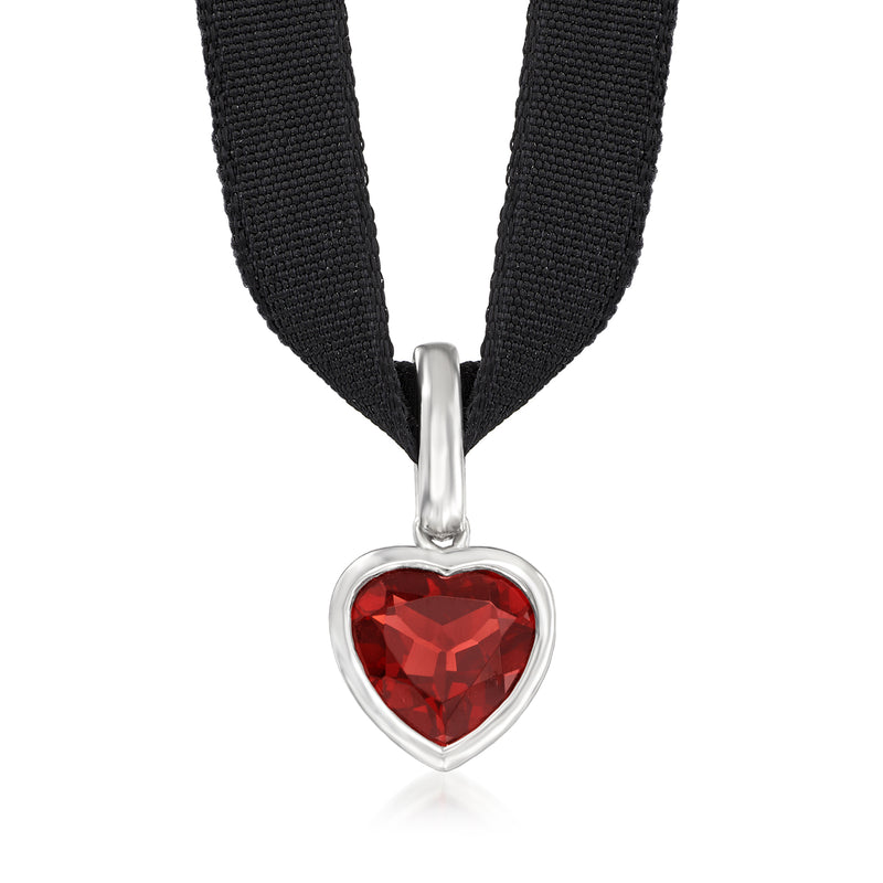 Black cord choker with red heart gemstone pendant in silver bezel clasp detail