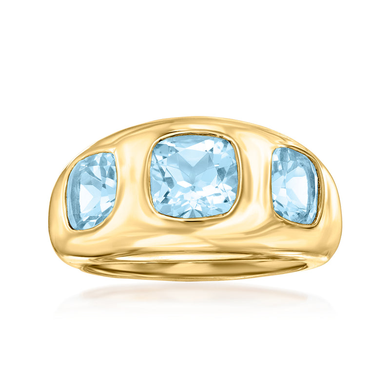 18kt gold three-stone ring with cushion-cut sky blue topaz and two oval side stones