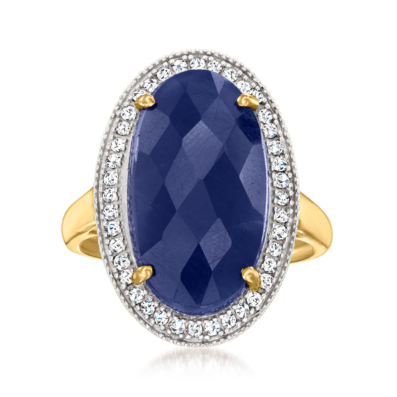 Oval sapphire gemstone ring with diamond halo and 14kt yellow gold band