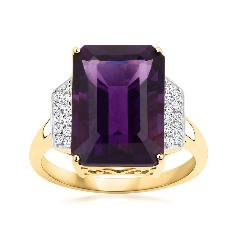 Amethyst and diamond ring in 14kt yellow gold, rectangular purple stone with side diamond accents