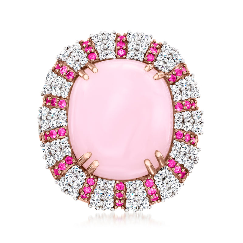 Oval pink gemstone halo ring in rose gold with white and pink stones