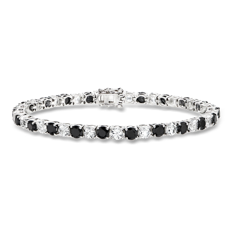 Sterling silver tennis bracelet with round black and clear gemstones, hinged clasp.