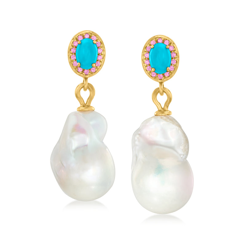Gold-tone drop earrings with turquoise cabochon, pink stone halo, and white baroque pearl