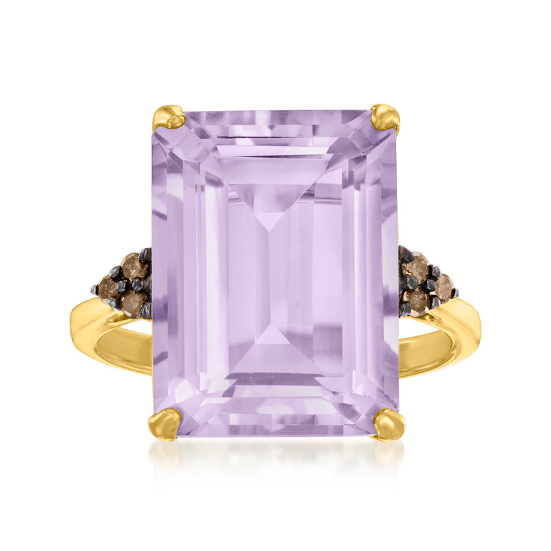 Gold cocktail ring with large rectangular amethyst and dark diamond side accents