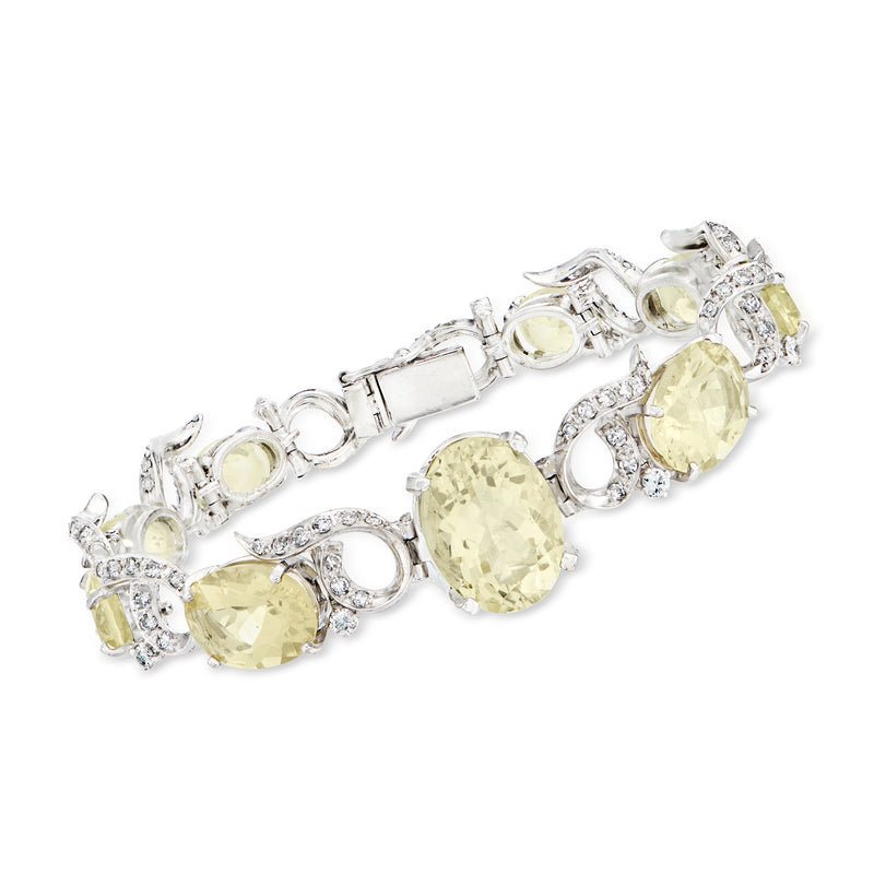 14kt white gold bracelet with oval lemon quartz and diamond accents, hinged links