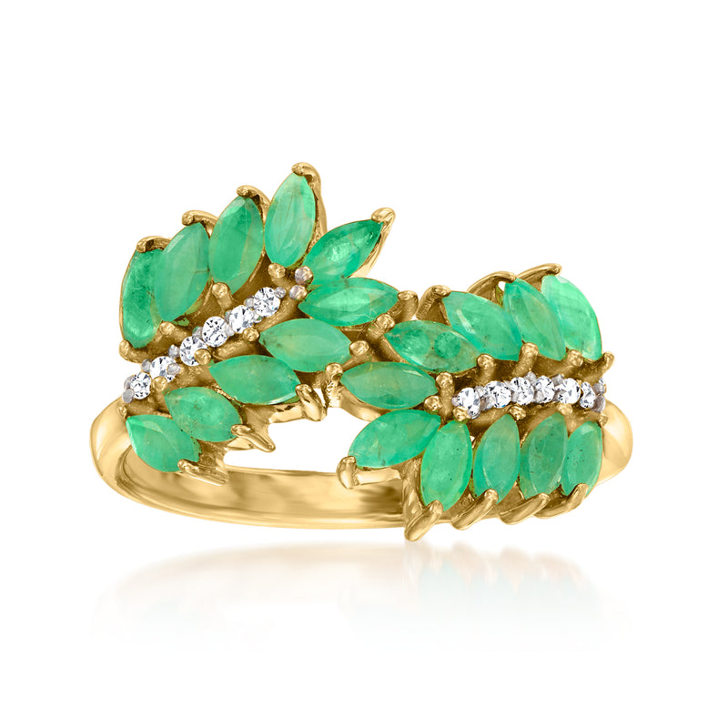 18kt gold leaf bypass ring with emerald-green oval stones and white zircon accents