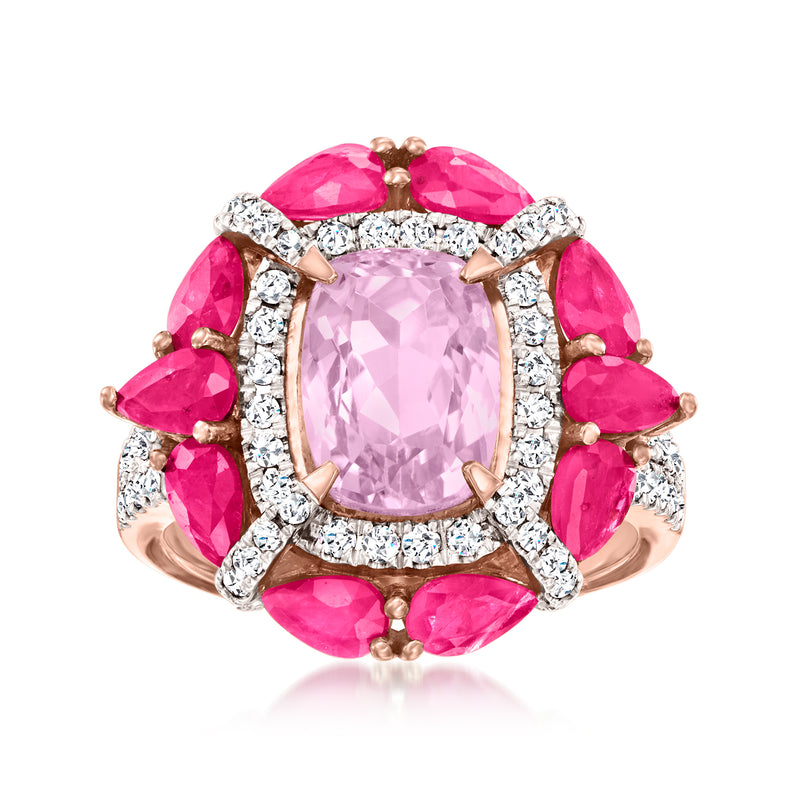 Oval pink gemstone cluster ring with ruby-like stones and diamond accents in rose gold.