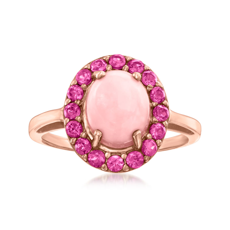 Rose gold ring with oval pink opal center and rhodolite garnet halo