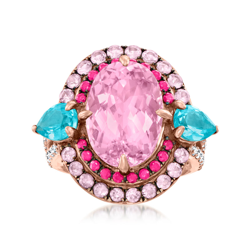 Rose-gold ring with oval pink kunzite center, pink halo, and turquoise side gems