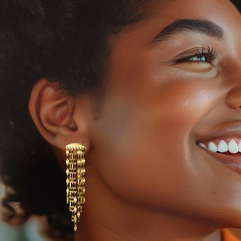 Gold-tone mirror-link drop earrings worn, long chain fringe dangling