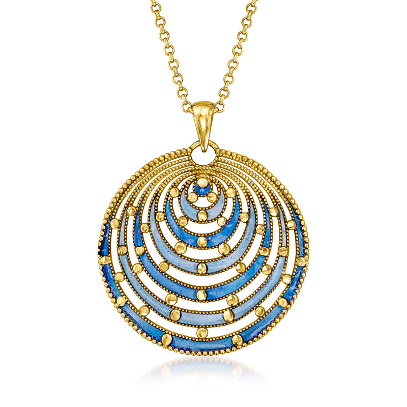 Gold-tone chain necklace with round blue enamel swirl pendant, scalloped edge.
