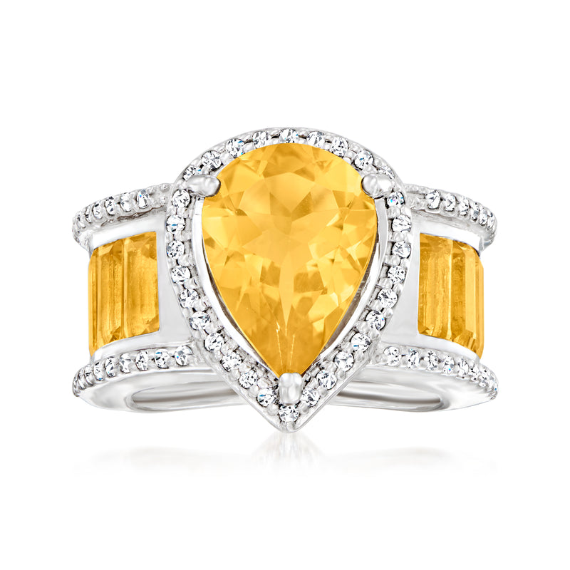 Sterling silver ring with pear-cut yellow citrine center and white gemstone halo