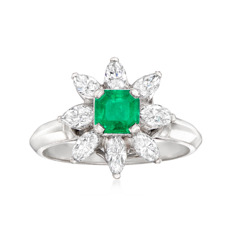 Platinum flower ring with emerald-green center and diamond marquise petals