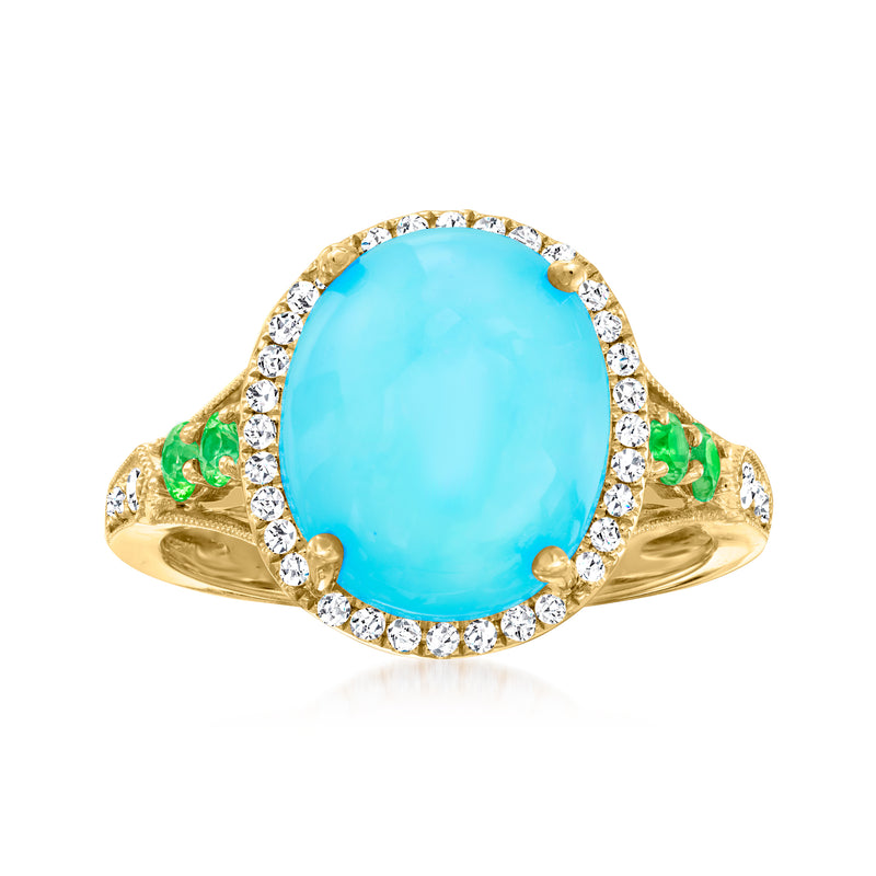 14kt yellow gold ring with oval turquoise center, diamond halo and small green stones