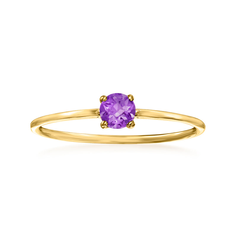 Amethyst ring in 14k yellow gold with oval purple gemstone and four round prongs