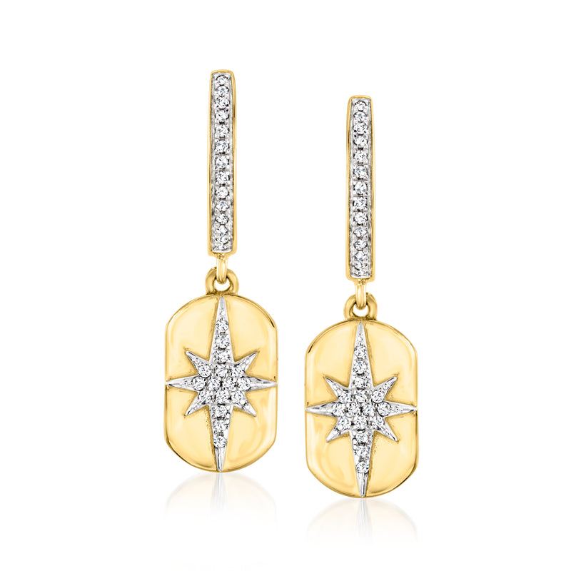 Gold hoop drop earrings with oval medallion and starburst diamond accents