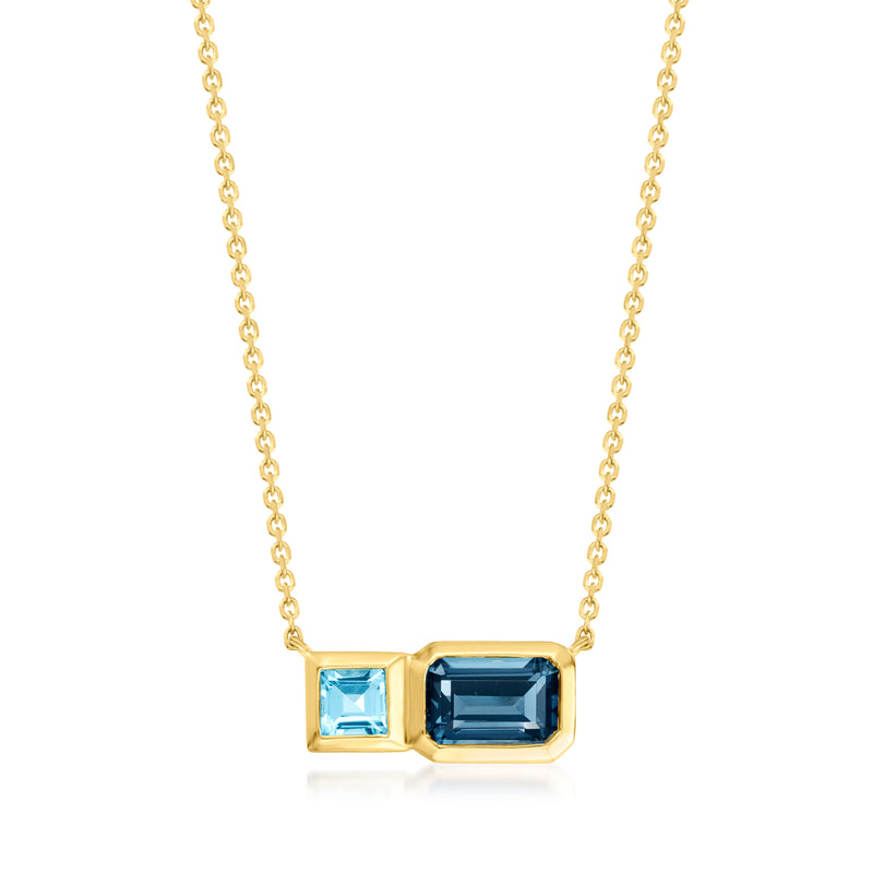 14kt yellow gold necklace with two rectangular blue topaz gemstones on a box setting