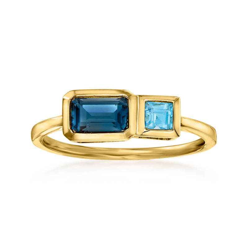 14kt yellow gold toi et moi ring with two rectangular blue topaz gemstones