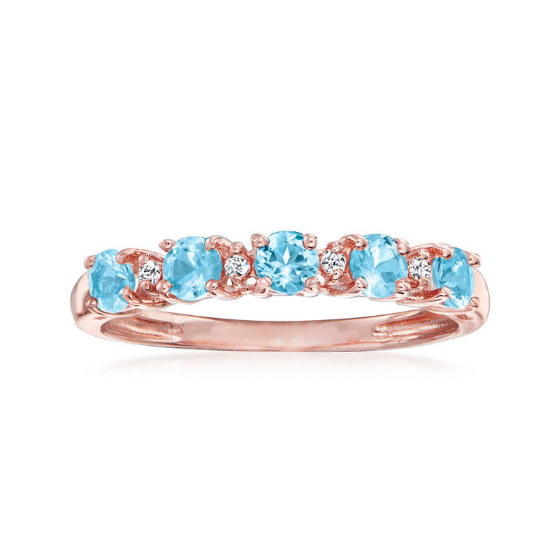 Rose gold over sterling ring with five oval blue topaz stones and diamond accents
