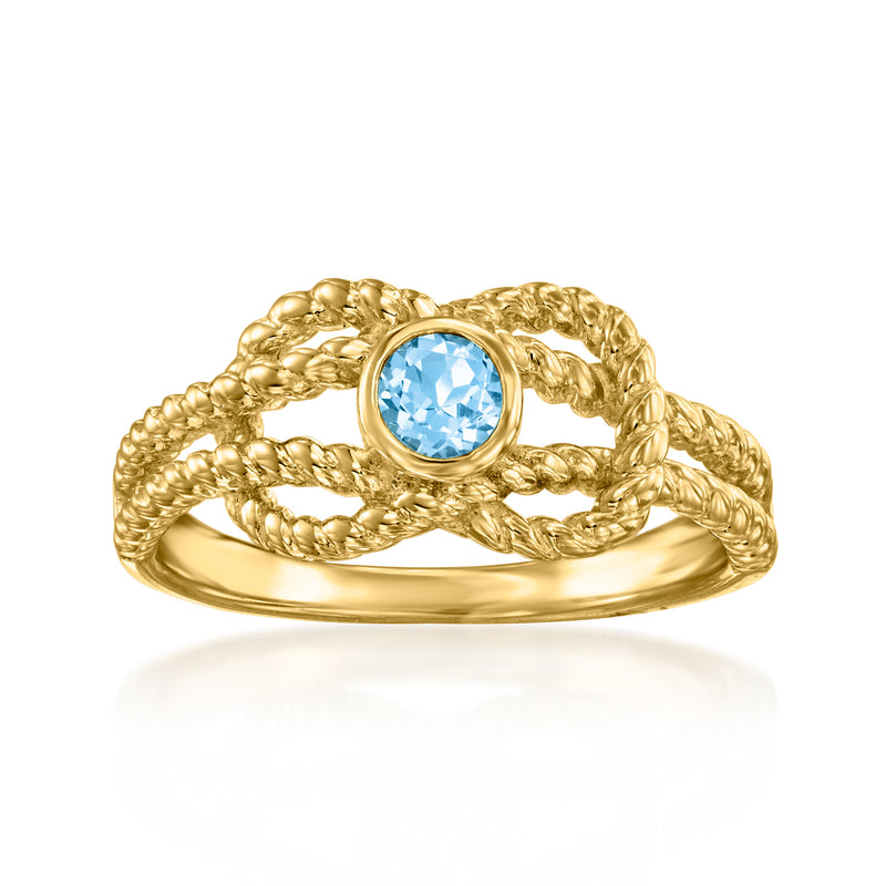 Roped gold ring with round Swiss blue topaz center stone