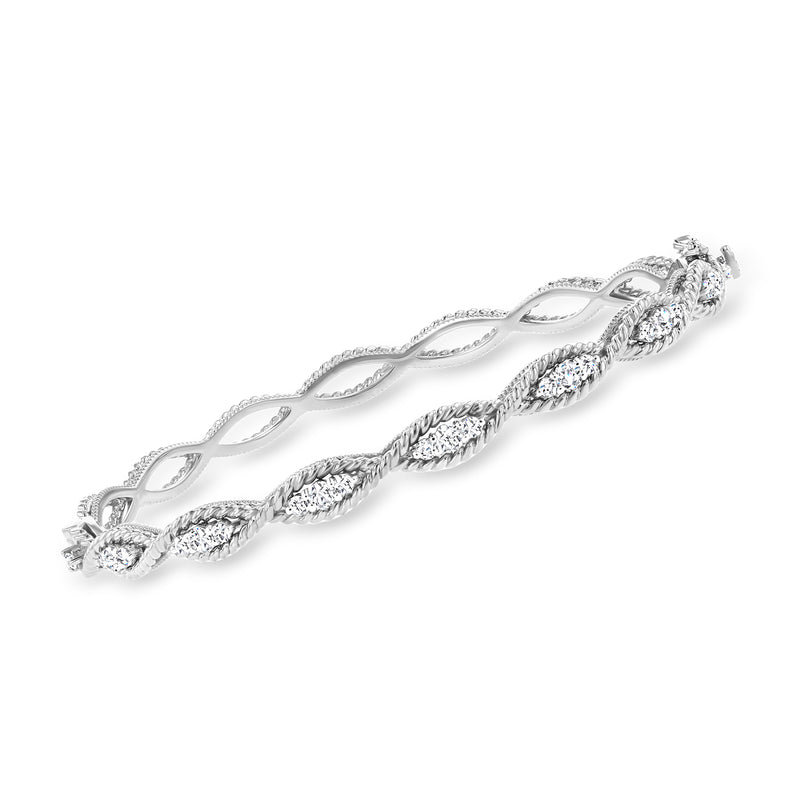 Diamond twisted bangle bracelet in 14kt white gold with open woven design
