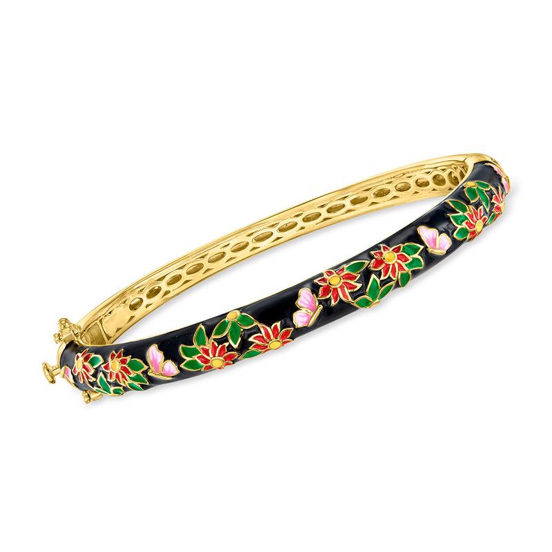 Gold-tone bangle bracelet with black enamel floral inlay and multicolor accents