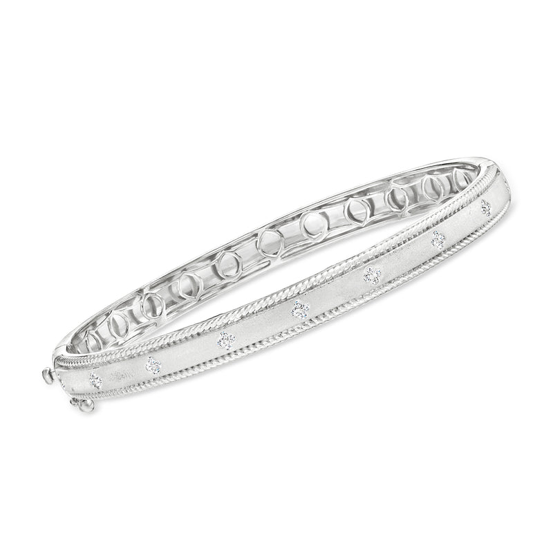 Sterling silver clover bangle bracelet with round diamond accents, hinged design