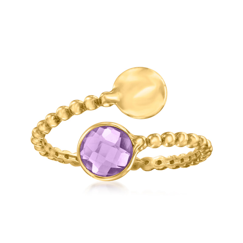 14kt yellow gold bypass ring with faceted oval amethyst center