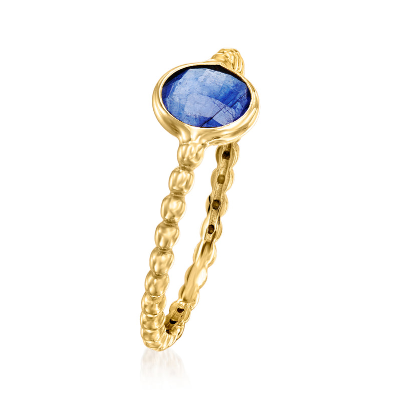 14kt yellow gold oval blue sapphire ring with twisted chain-like beaded band