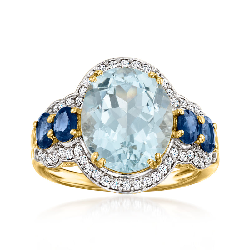 Aquamarine center ring with sapphire side stones, diamond halo, 14kt yellow gold