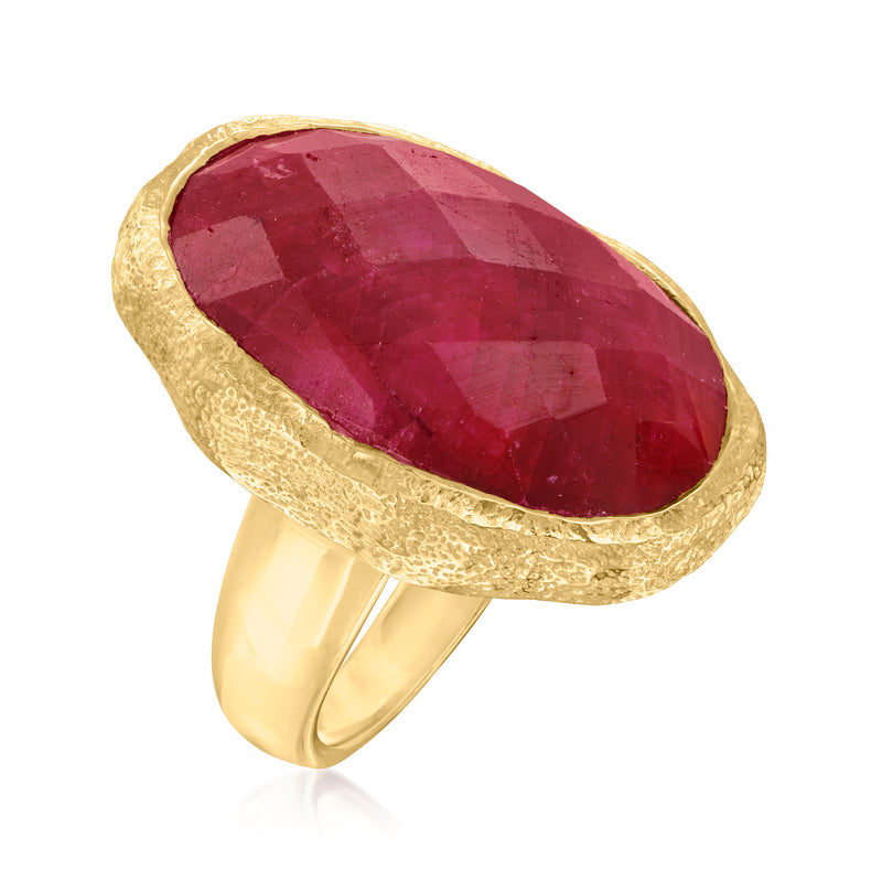 Side view oval ruby gemstone ring with textured gold bezel and band