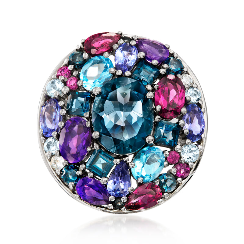 Sterling silver ring with large blue centerpiece and colorful oval gems