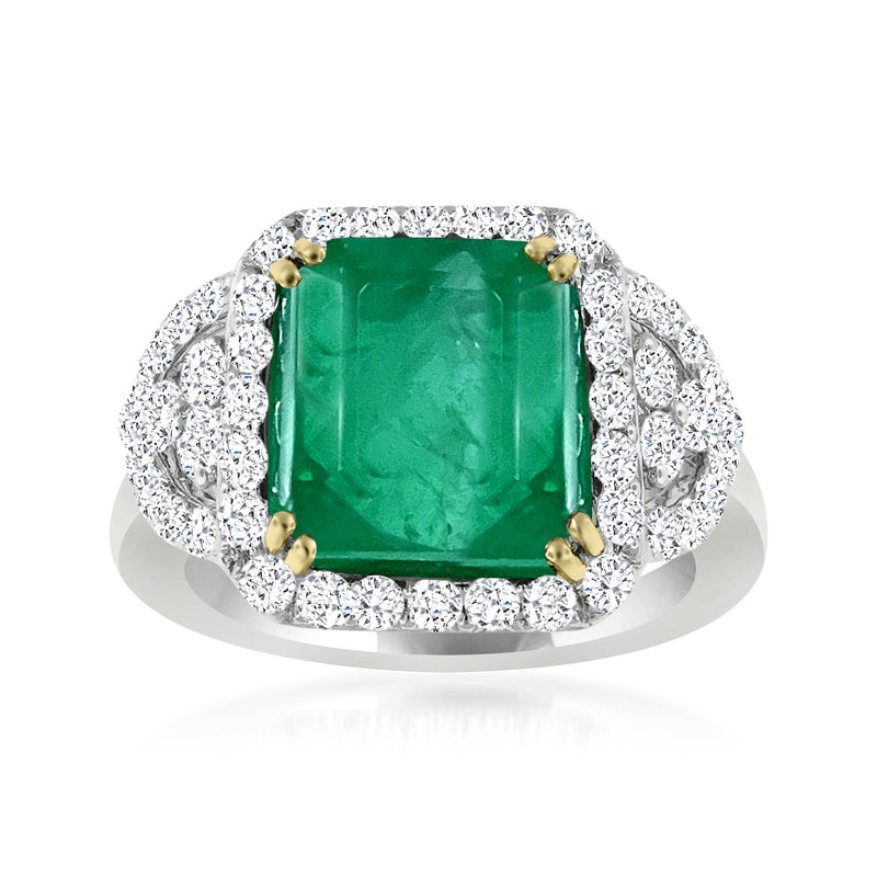 Emerald and diamond ring in white gold with large green center stone