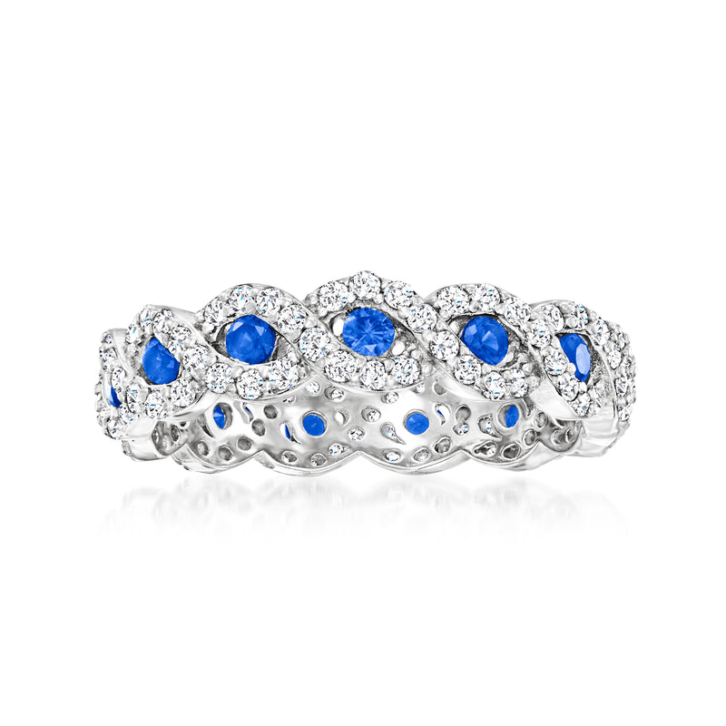 Sterling silver eternity band with oval blue simulated sapphires and clear CZ accents