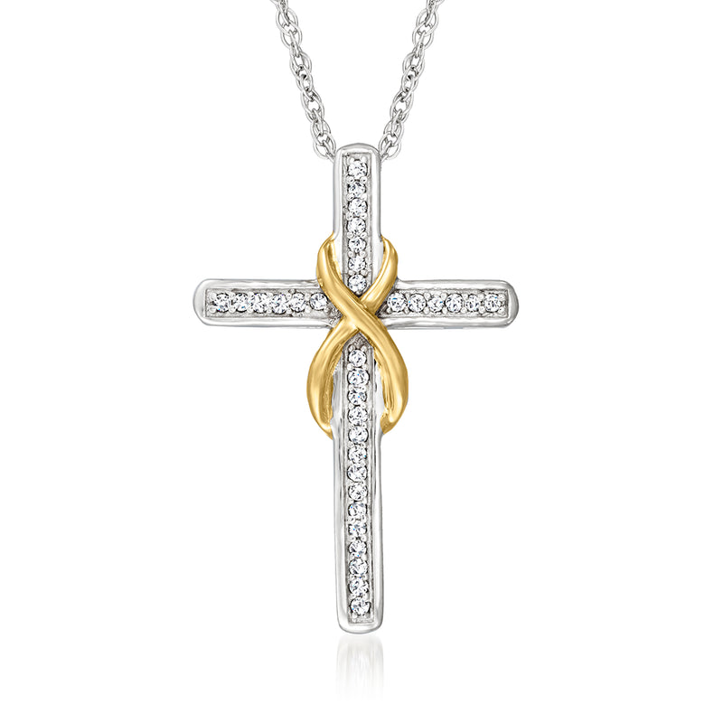 Two-tone sterling silver diamond cross pendant necklace with bezel-set stones, hanging on chain