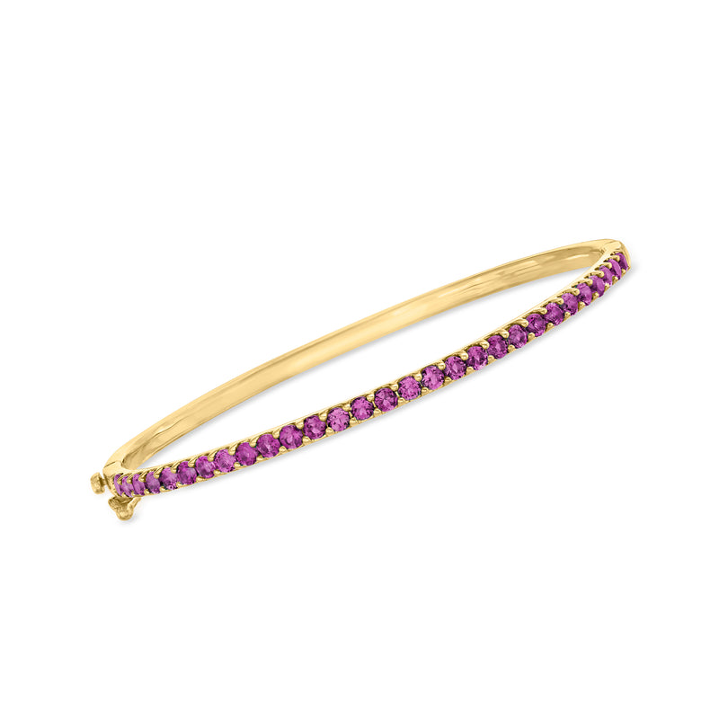 Gold over sterling bangle bracelet with purple amethyst stone row