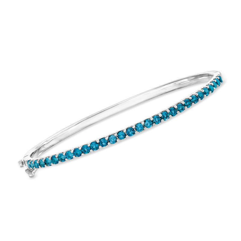 Sterling silver bangle bracelet with blue topaz stones