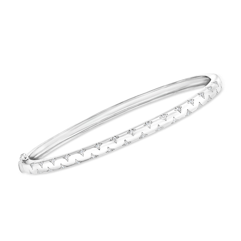 Sterling silver bangle bracelet with repeating star motifs and clear stones