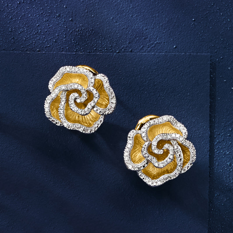 Gold over sterling diamond flower stud earrings with gold center and white stone border