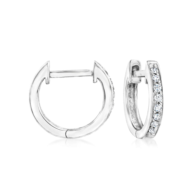 Sterling silver diamond huggie hoop earrings, one front and one side view