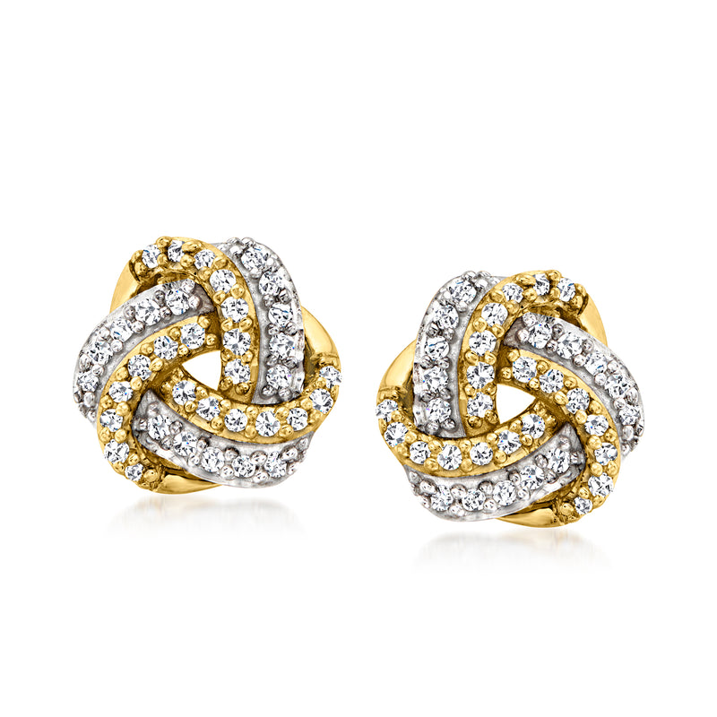 Two-tone gold diamond love knot stud earrings with sparkling white stones