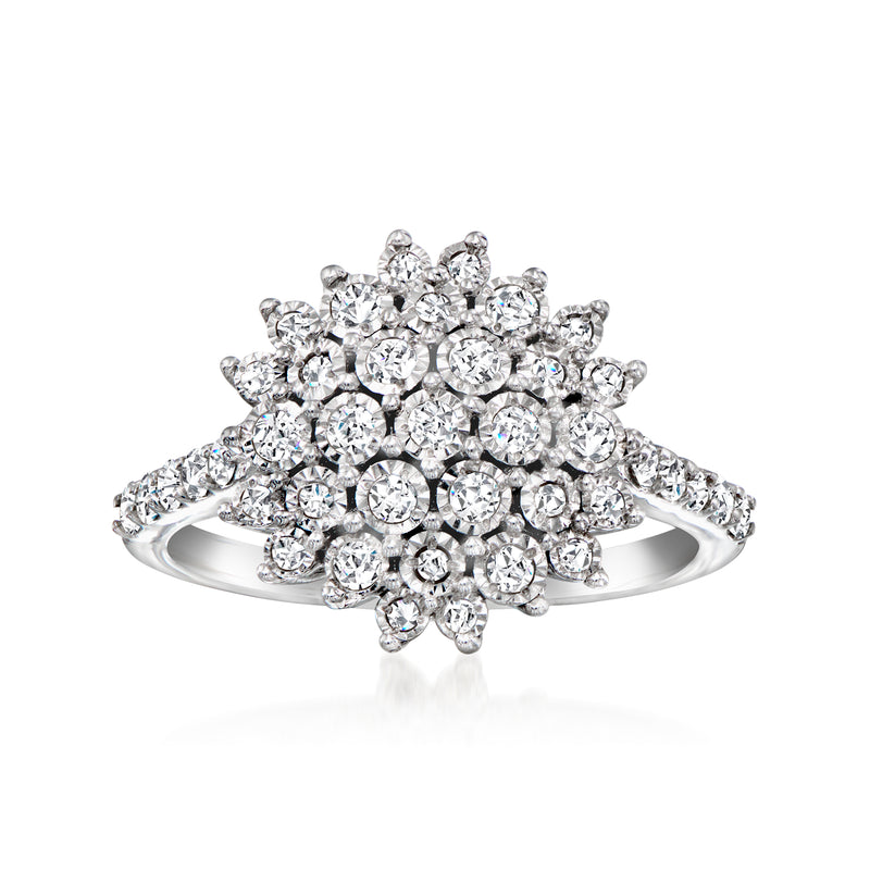 14kt white gold diamond cluster ring with round center and pavé-style band