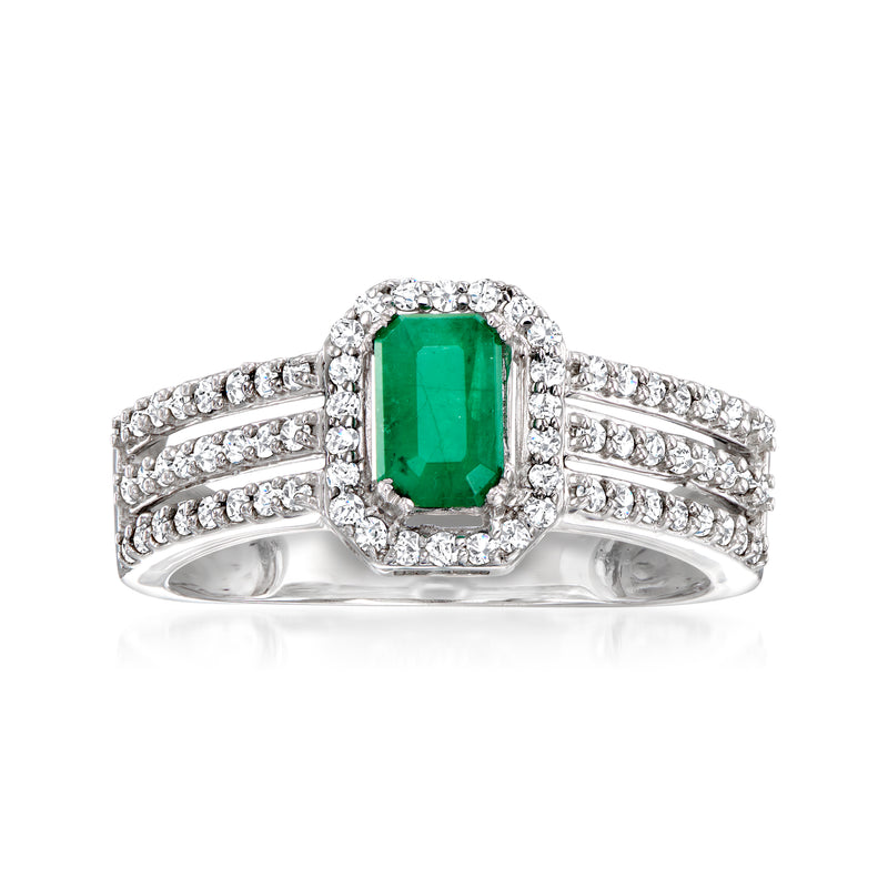 14k white gold ring with emerald-cut green gemstone and diamond halo and bands