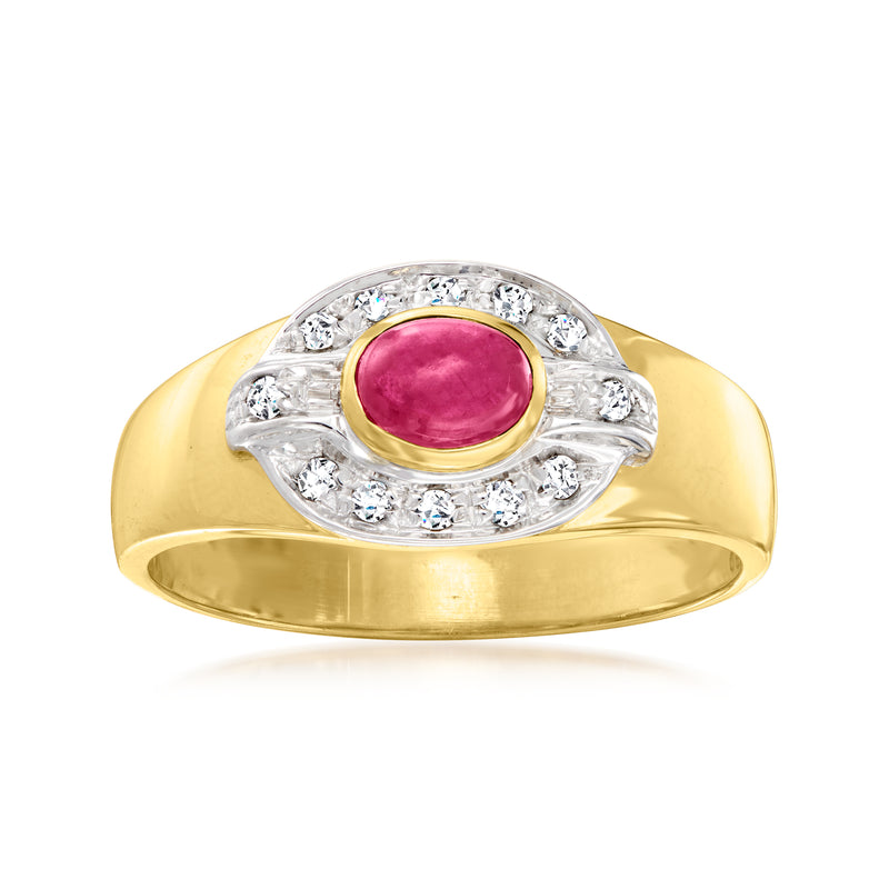 Vintage 18kt yellow gold ring with oval ruby cabochon and diamond halo